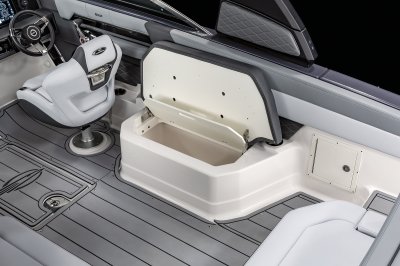 Chaparral SSX 8 bench lifts up for access to insulated, draining cooler. 