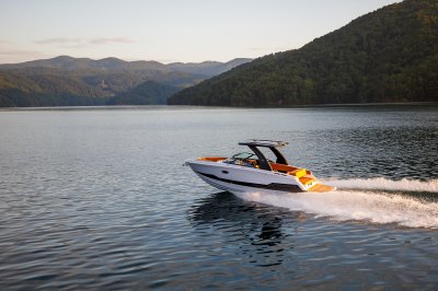 Chaparral SSX 8 gliding across a freshwater lake with mountains in the background 