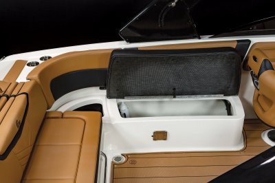 Chaparral 28 SURF storage under port bench seat with removable cushion for bilge access. 