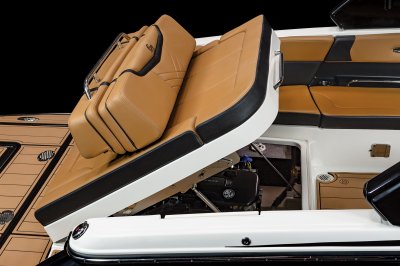 Chaparral 28 SURF lid under aft bench folds up to give wide engine bay access. 