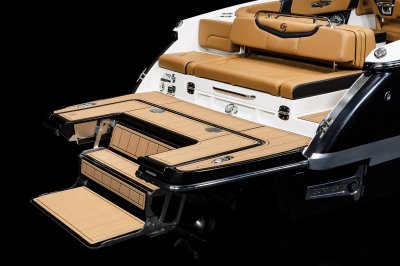 Chaparral 28 SURF Infinity Power Step folds out from the swim platform providing steps into the water. 