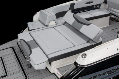 Chaparral 30 SURF the aft bench seat folds out to create an aft-facing lounge seat. 
