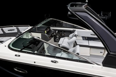 Chaparral 30 SURF has matched consoles with bucket seats mounted at each. 