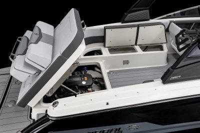 Chaparral 30 SURF lid under aft bench folds up to give wide engine bay access. 