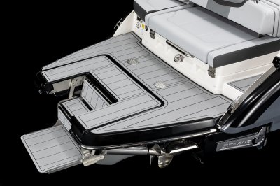 Chaparral 30 SURF Infinity Power Step folds out from the swim platform providing steps into the water. 