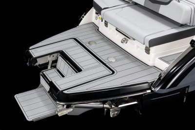 Chaparral 30 SURF Infinity Power Step folds out from the swim platform providing steps into the water 